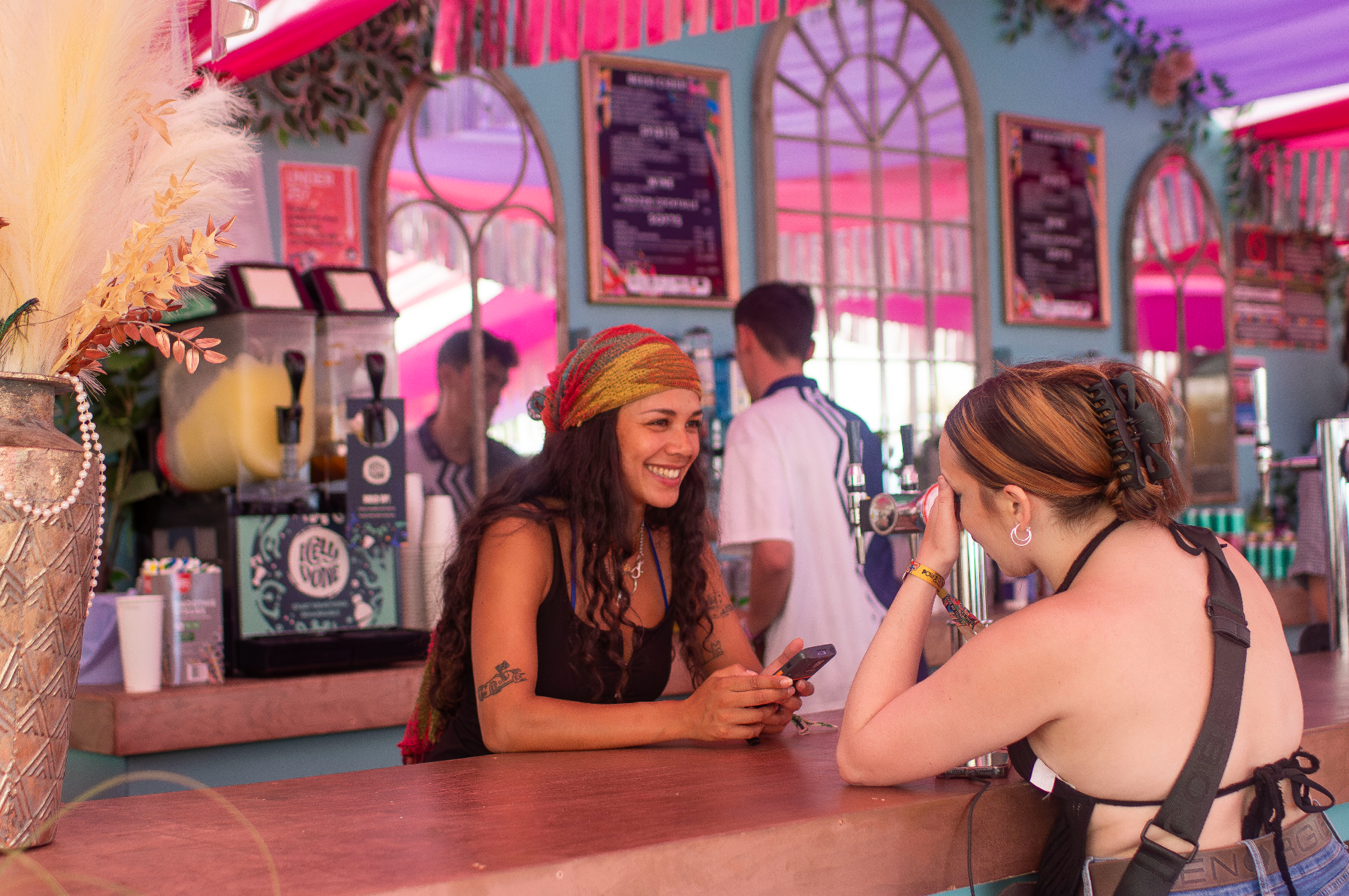 A member of the bar team serving a guest